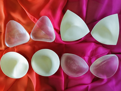 A selection of foam and silicone bust enhancers for swimwear in a variety of shapes and sizes