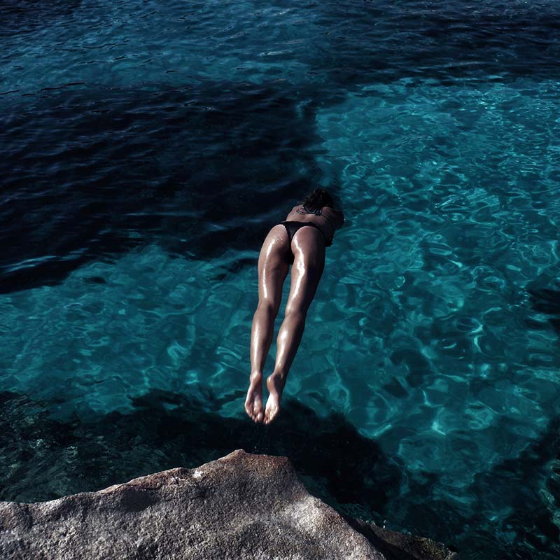 Woman dives into sea